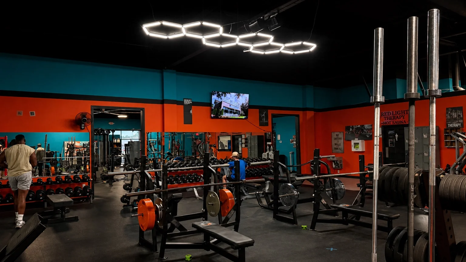 Dumbbell racks, benches and strength machines in Sync’s free-weight area